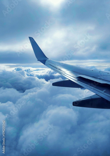 The plane flies among the clouds.