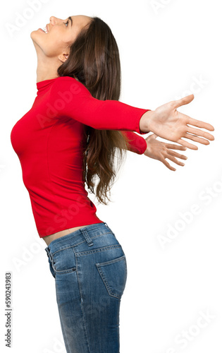 Side view of a young woman with her arms oustretched photo