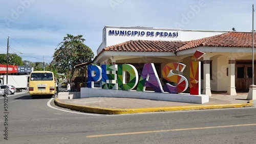 Panama, Pedasi town, welcome multicolored sign of town in summer photo