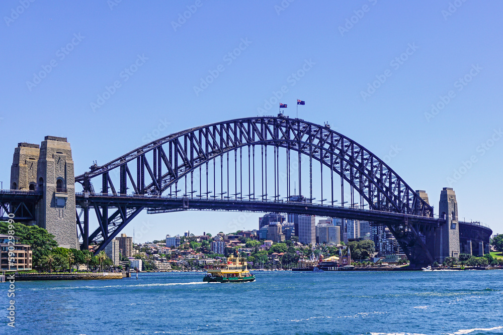 The Sydney Harbor Bridge is a heritage-listed steel through arch bridge,  nicknamed The Coathanger because of its arch-based design and carries rail, vehicular, bicycle and pedestrian. Australia, 2017
