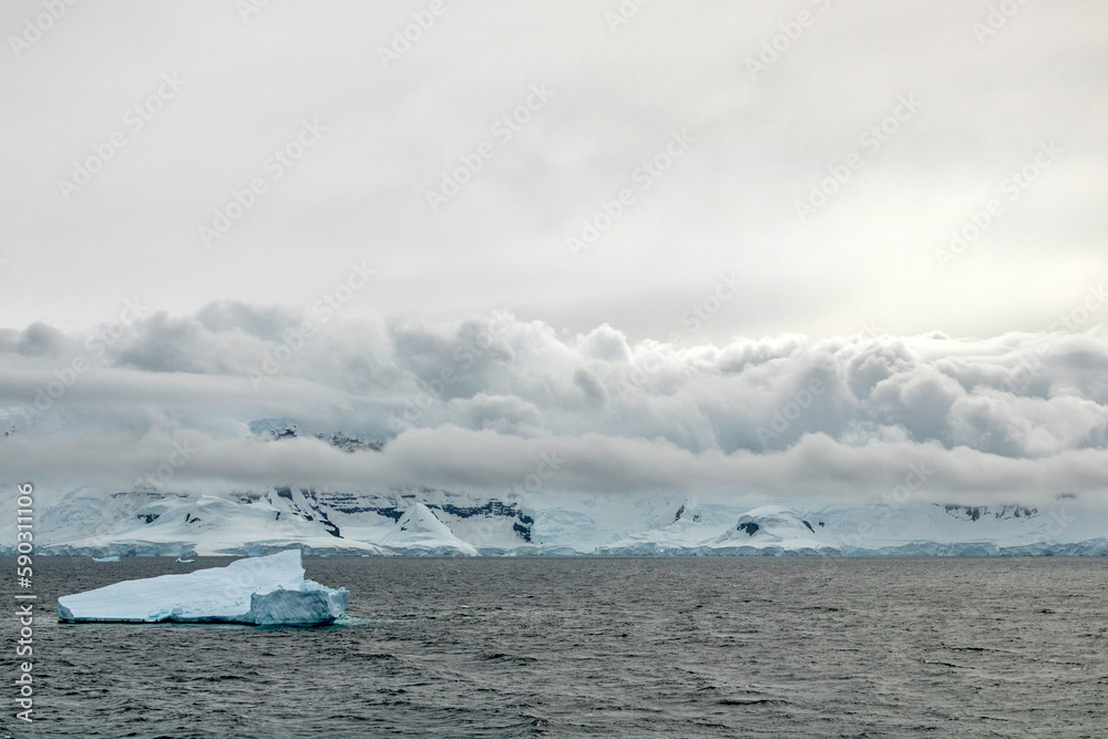 Low clouds over Antarctic Mountains from the Neumayer Channel in Antarctica