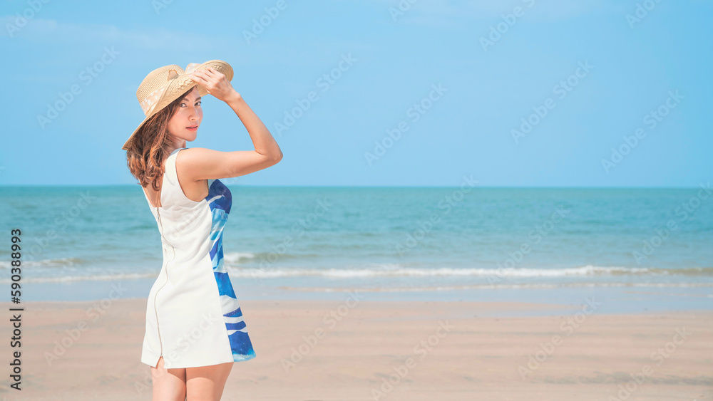 Female feeling good and enjoying freedom at sea. Young beautiful woman on sunset beach. Summer vacation. Sunny