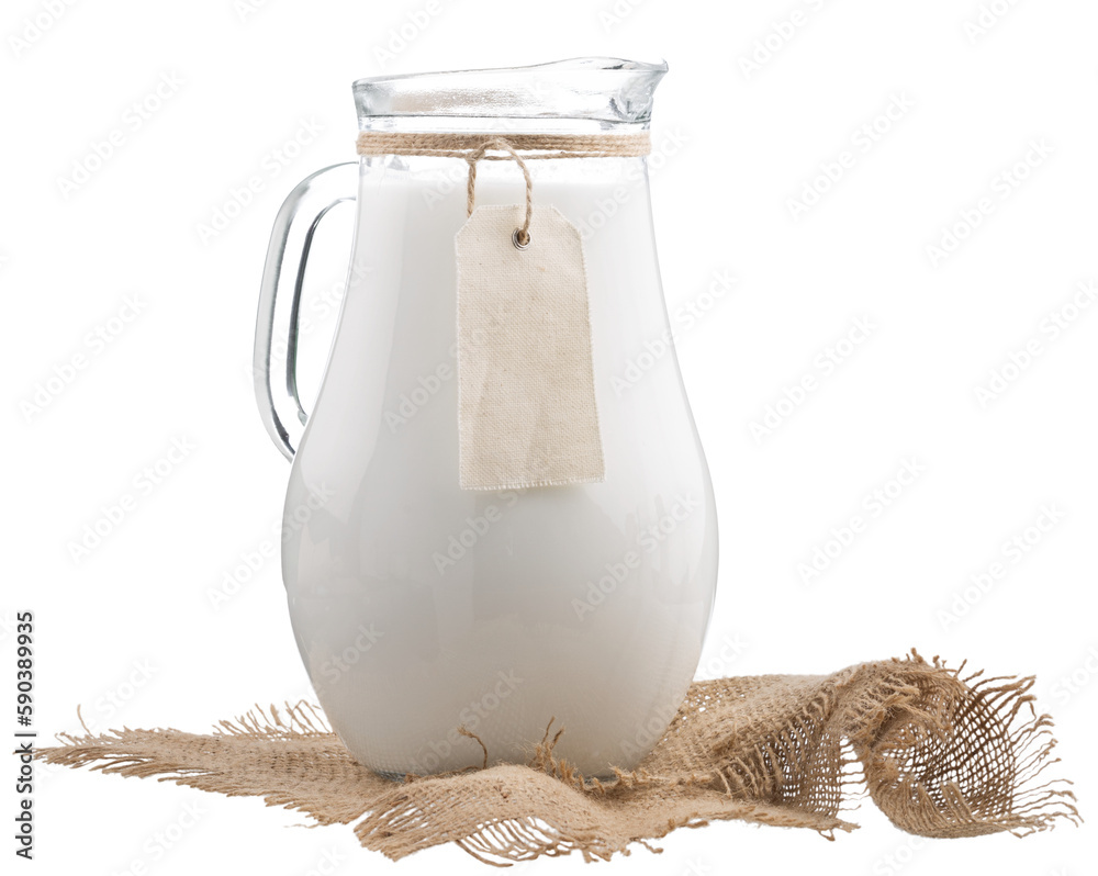 Fresh organic milk in glass and jug on rustic wooden table on nature background. - obrazy, fototapety, plakaty 
