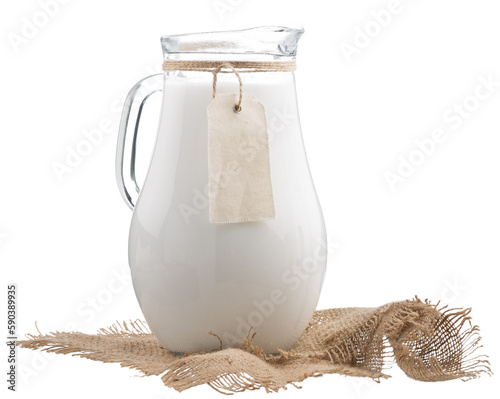 Obraz na plátně Fresh organic milk in glass and jug on rustic wooden table on nature background