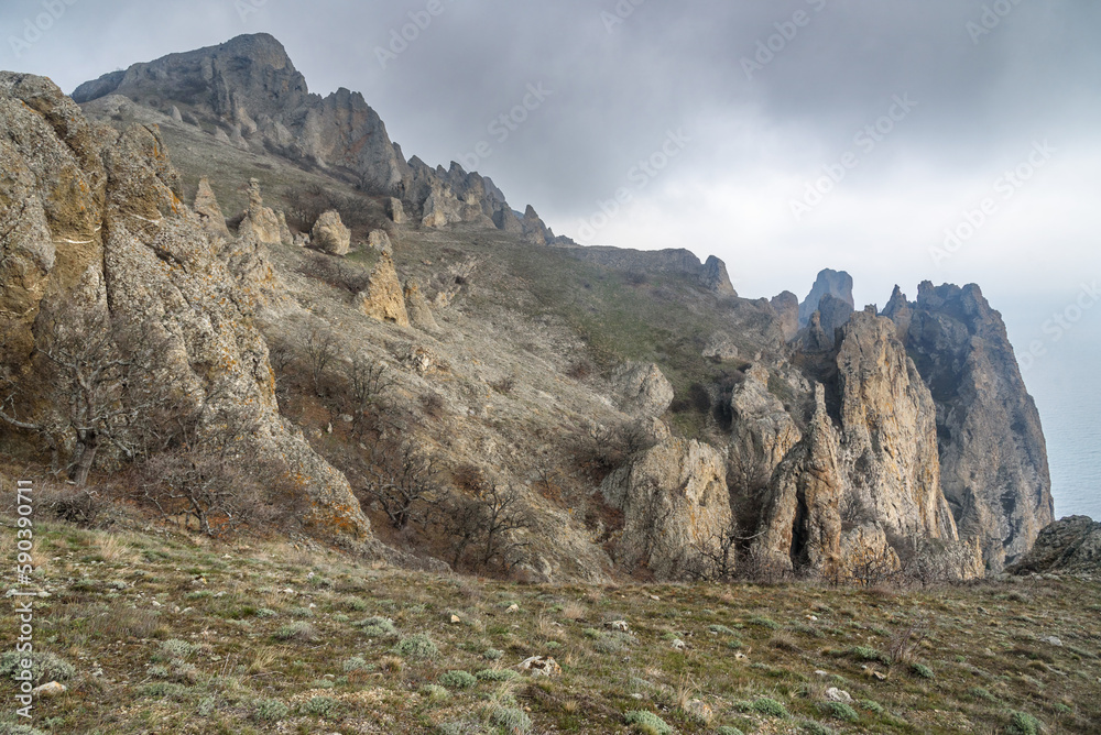 Fototapeta premium Rocks in Dead city. Khoba-Tele Ridge of Karadag Reserve in spring. Crimea