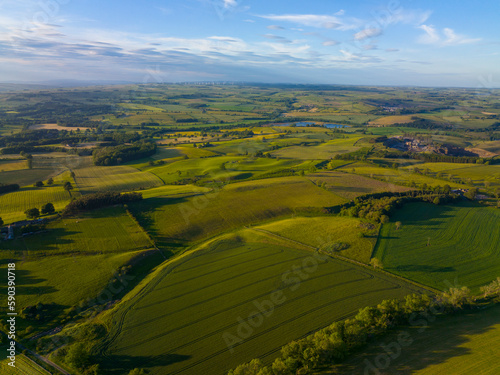 Aerial view of Northumberland countryside near Hadrian's Wall ruin at village of Chollerford in town of Hexham in England, UK.  photo