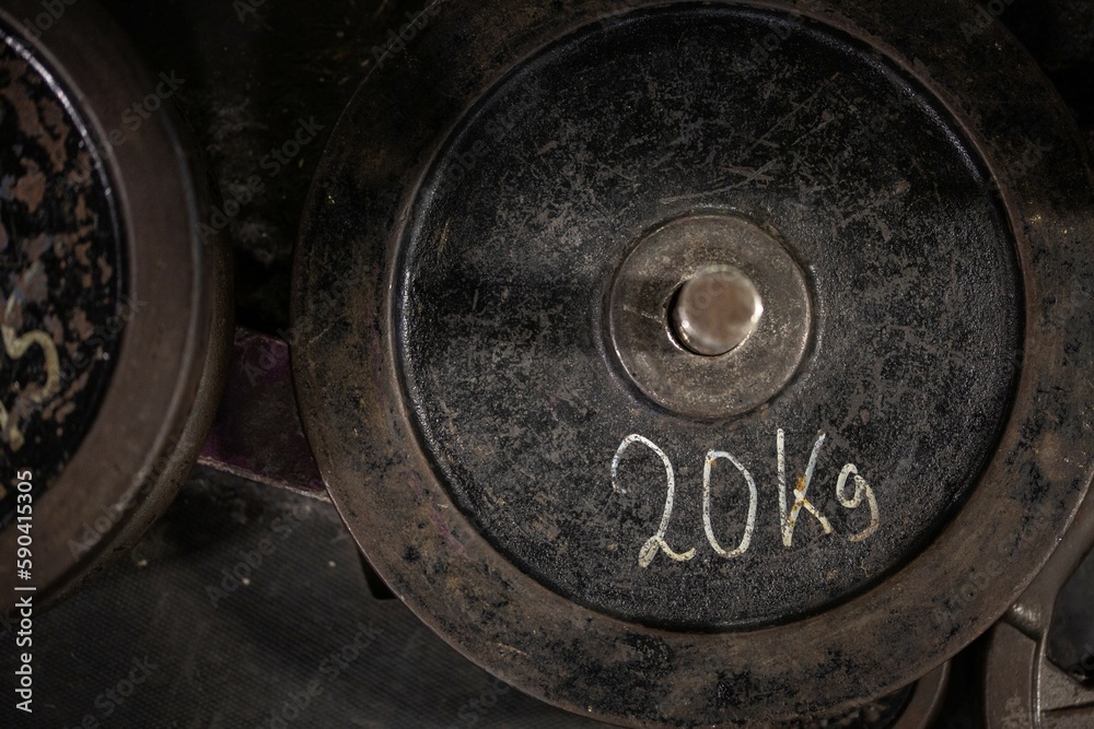 Close up detail shots of weights in an old school bodybuilding gym