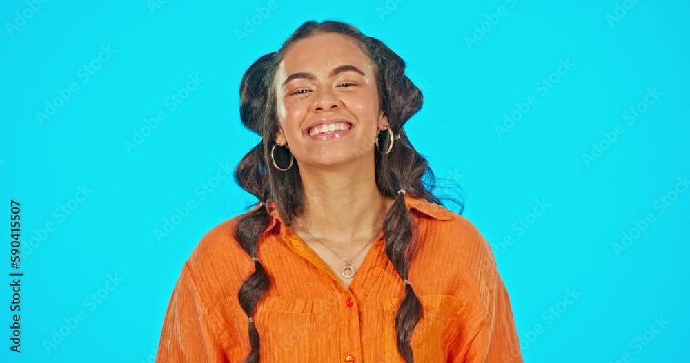 Happiness, celebration and success, woman on studio backdrop with mockup space, winning and achievement. Excited gen z model, smile and happy girl winner with goal emoji, victory and blue background.