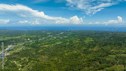 Rural area with agricultural land and rice fields in the tropics. Negros, Philippines