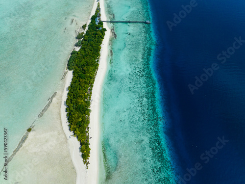 Top view of atoll and tropical island Mataking with beach. Tun Sakaran Marine Park. Borneo, Sabah, Malaysia. photo