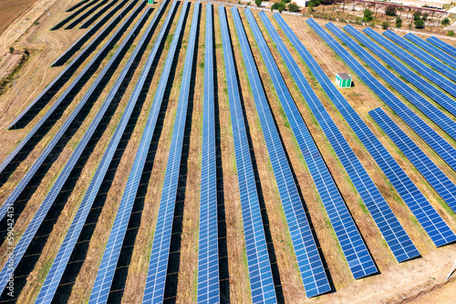 Aerial top view from drone of a field of solar panels