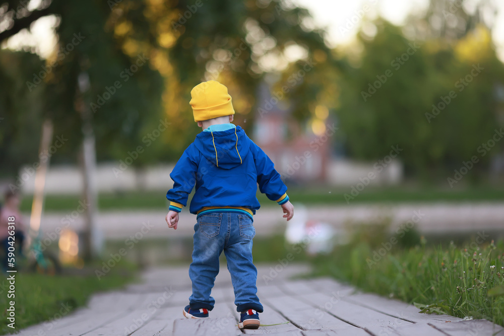 Fototapeta premium autumn park walk boy, childhood happiness
