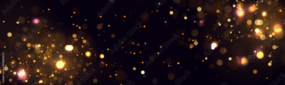 Golden abstract bokeh on black background. Christmas or holiday card decoration