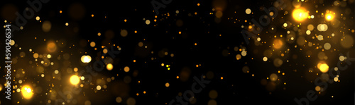 Golden abstract bokeh on black background. Christmas or holiday card decoration