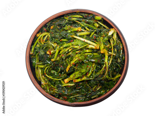 Canola(oilseed rape) Kimchi in an earthen bowl isolated on a png background. Korean food.