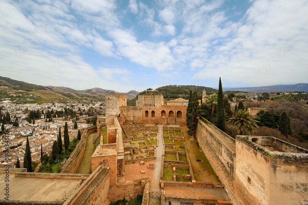 The walls of the Alcazaba in the Alhambra and the panorama of Granada.
