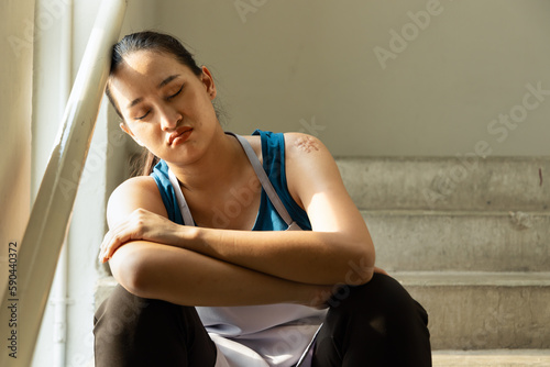 Принти на полотні Sad unhappy and depressed Asian cleaning service worker woman, concept image of