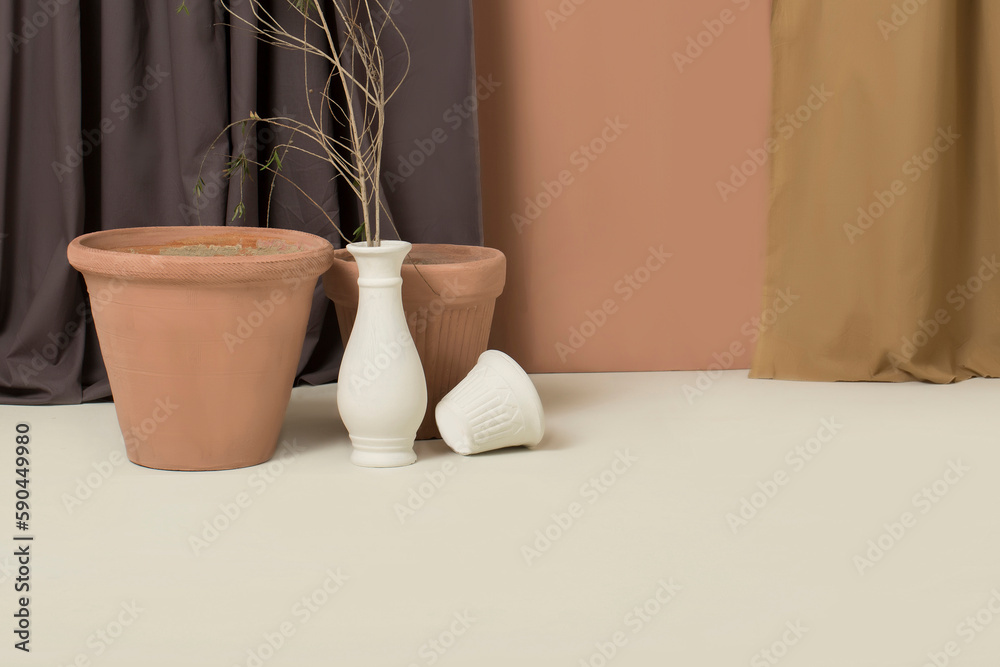 Studio set background with clay pots and curtains in terracotta, gray and white colors