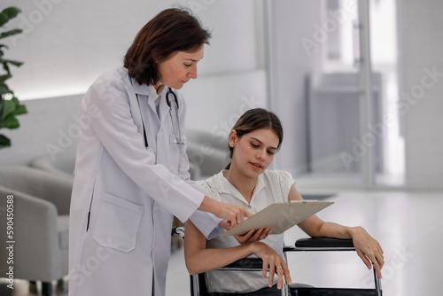 Doctor talks to the patient about the diagnosis and lab test results. Explaining how medical procedures work and giving patients advice about hygiene  preventive care  lifestyle changes and dieting.