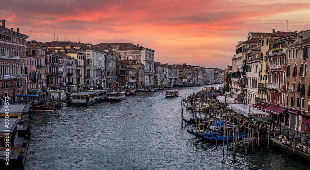 High-angle shot of the Grand Canal at sunset in Venice, Italy.