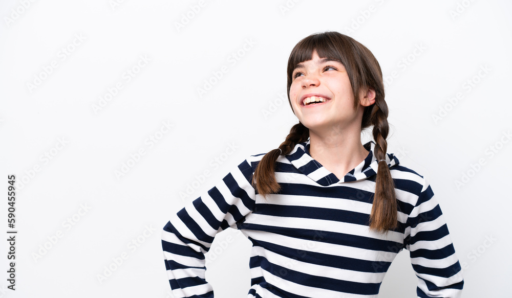 Little caucasian girl isolated on white background posing with arms at hip and smiling Little caucasian girl isolated on white background posing with arms at hip and smiling
