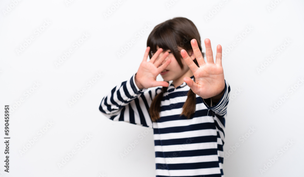 Little caucasian girl isolated on white background nervous stretching hands to the front Little caucasian girl isolated on white background nervous stretching hands to the front