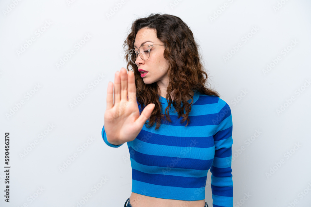 Young caucasian woman isolated on white background making stop gesture and disappointed Young caucasian woman isolated on white background making stop gesture and disappointed