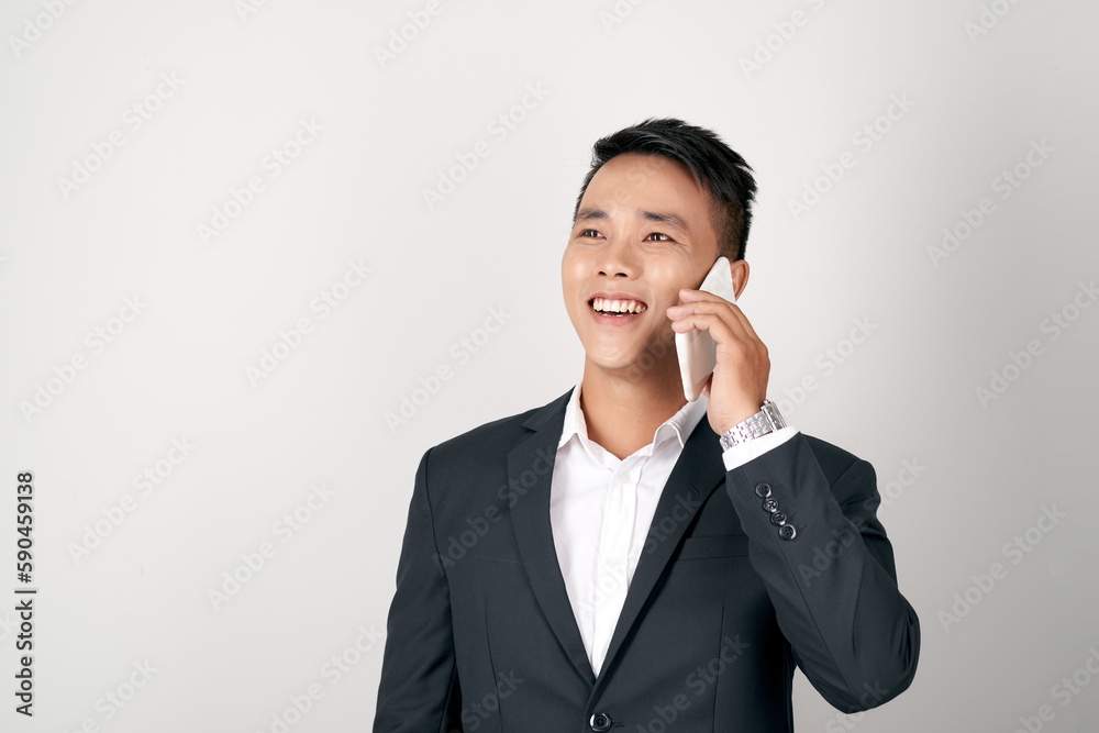 Business man negotiating on phone, isolated on white Business man negotiating on phone, isolated on white