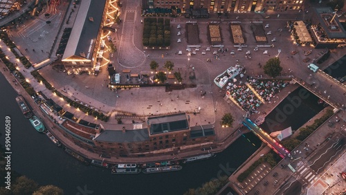 Aerial shot of the canal with boats in Granary Square City park in London photo