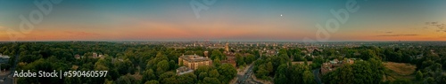 Panoramic shot of the Hampstead with multiple buildings and roads at sunset