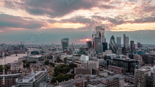 Mesmerizing cityscape view with high and modern skyscrapers at scenic sunset in London