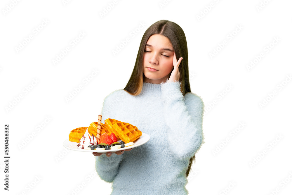 Teenager girl holding waffles over isolated chroma key background with headache Teenager girl holding waffles over isolated chroma key background with headache