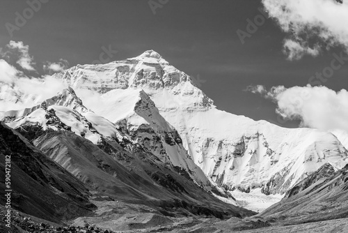 Spectacular mountain scenery on the Mount Everest Base Camp trek through the Himalaya, Nepal in stunning black and white Group of climbers reaching the Everest summit in Nepal. view of Mount Everest