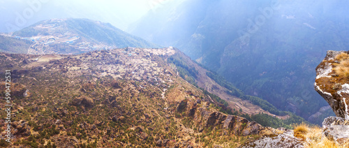 View of Namche Bazar mountain village in Nepal from a high cliff. Amazing panoramic view photo