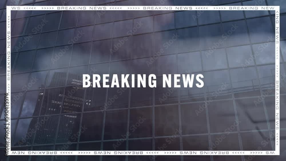 Person typing on a keyboard projected on a glass business building with the BREAKING NEWS writing Person typing on a keyboard projected on a glass business building with the BREAKING NEWS writing