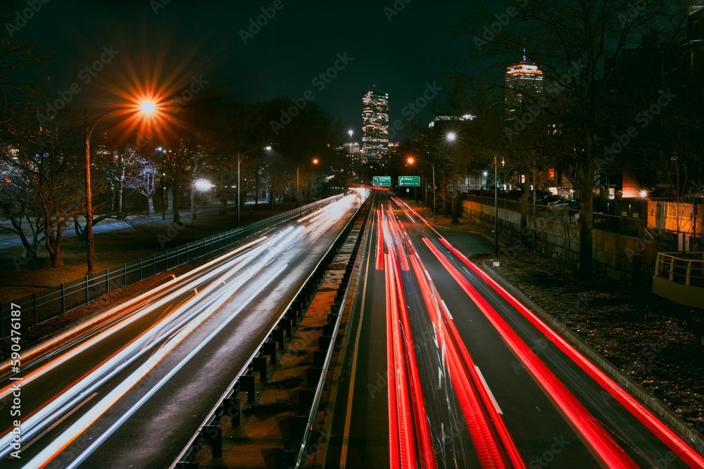 Urban street night traffic with bokeh lights