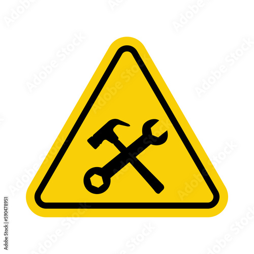 Under construction sign. Warning sign under construction. Yellow triangle sign with crossed hammer and wrench icon inside. Caution at the construction site. Workers, machinery and other obstacles.