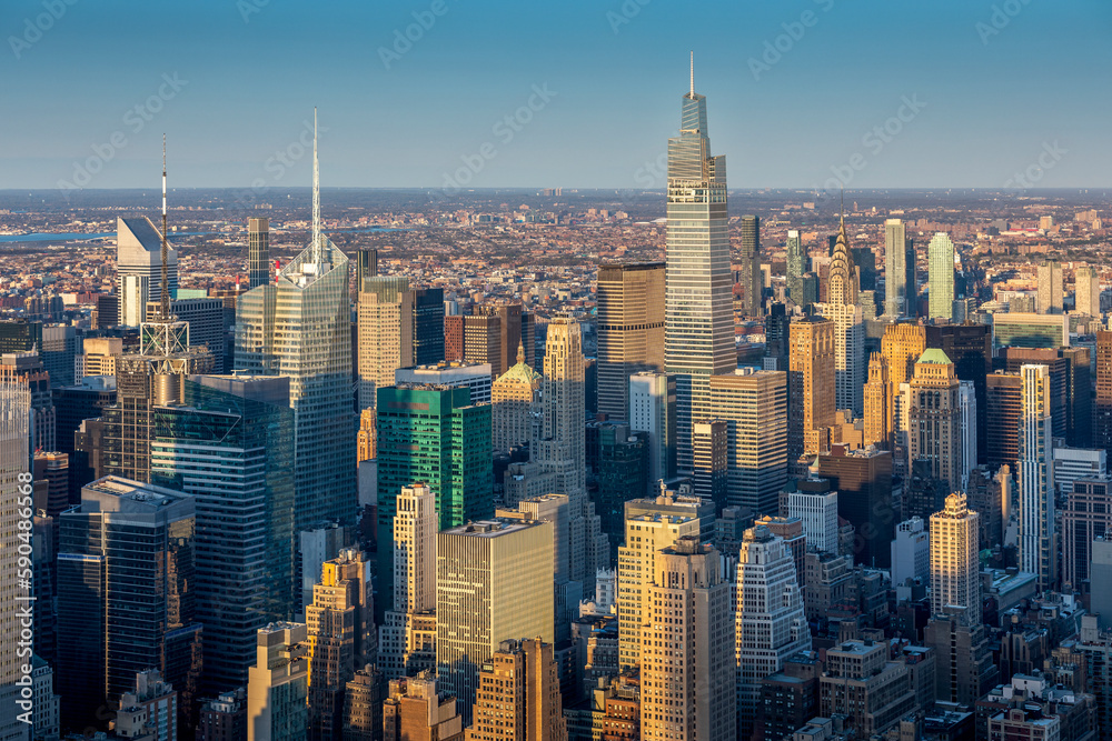 New York, USA - April 30, 2022: Nice view of skyscrapers at sunset in Manhattan, New York City - obrazy, fototapety, plakaty 