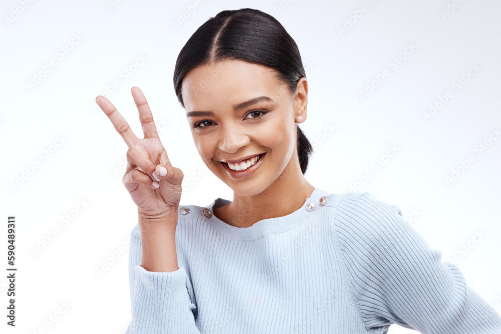 Peace sign, woman portrait and hand with emoji gesture in a studio with happiness on backdrop. V hands, isolated and white background of a gen z and young model with a happy smile and cool hands Peace sign, woman portrait and hand with emoji gesture in a studio with happiness on backdrop. V hands, isolated and white background of a gen z and young model with a happy smile and cool hands
