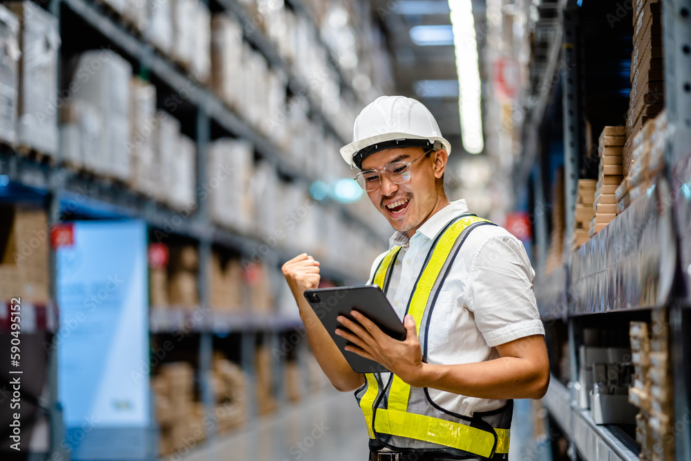 Warehouse Worker using digital tablets to check the stock inventory in large warehouses, a Smart warehouse management system, supply chain and logistic network technology concept. Warehouse Worker using digital tablets to check the stock inventory in large warehouses, a Smart warehouse management system, supply chain and logistic network technology concept.