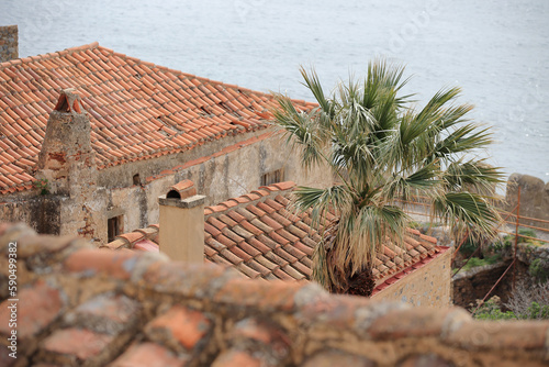 Monemvasia - roofs and chimneys of tenement houses from Byzantine times in Monemvasia in Peloponnese (Greece)