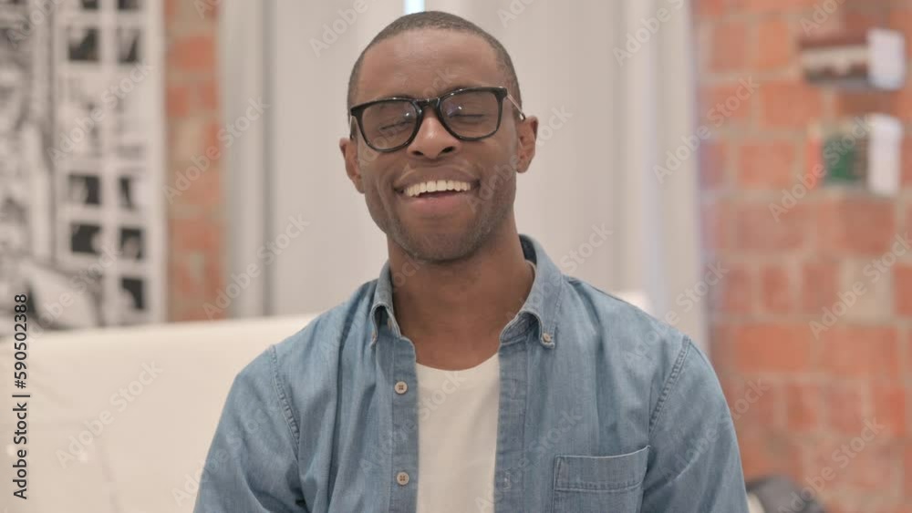 Portrait of Smiling African Man Student Looking at Camera Portrait of Smiling African Man Student Looking at Camera