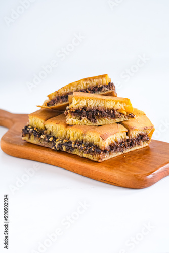 martabak manis, martabak terang bulan is large pancake  filled chocolate and peanut, Indonesian snack.
 photo