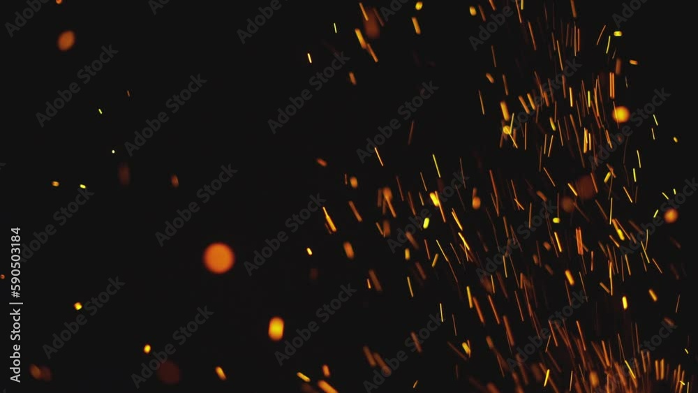 Beautiful fire sparks in the night, dark background. Loop animation Beautiful fire sparks in the night, dark background. Loop animation