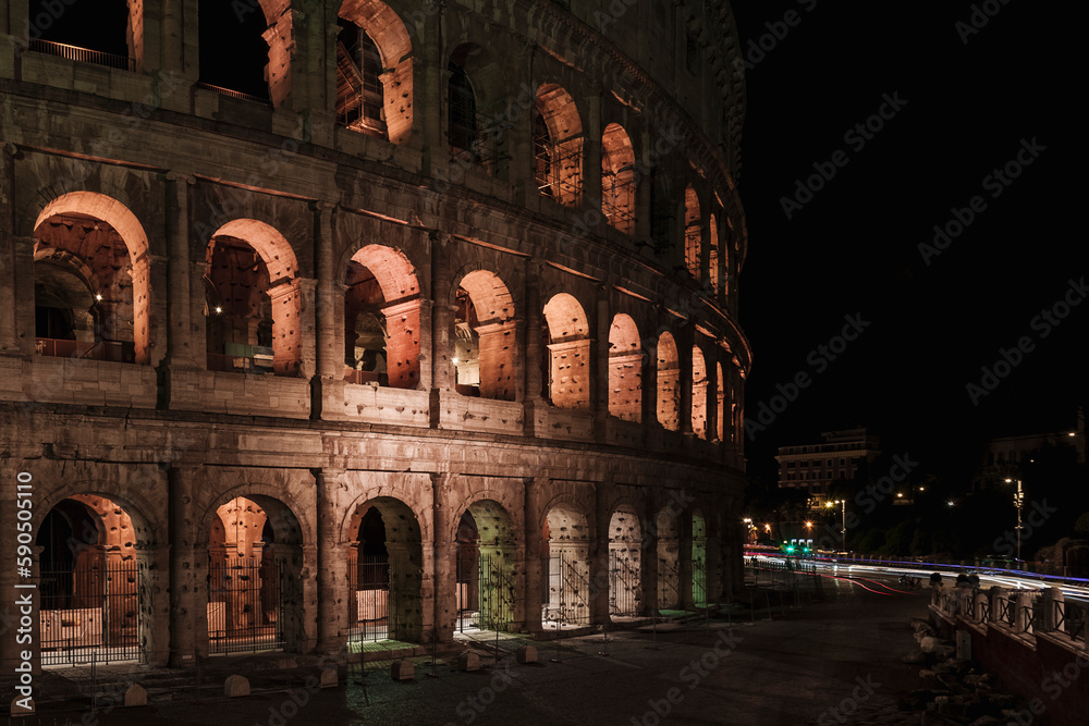 less known side of the colosseum photographed at night