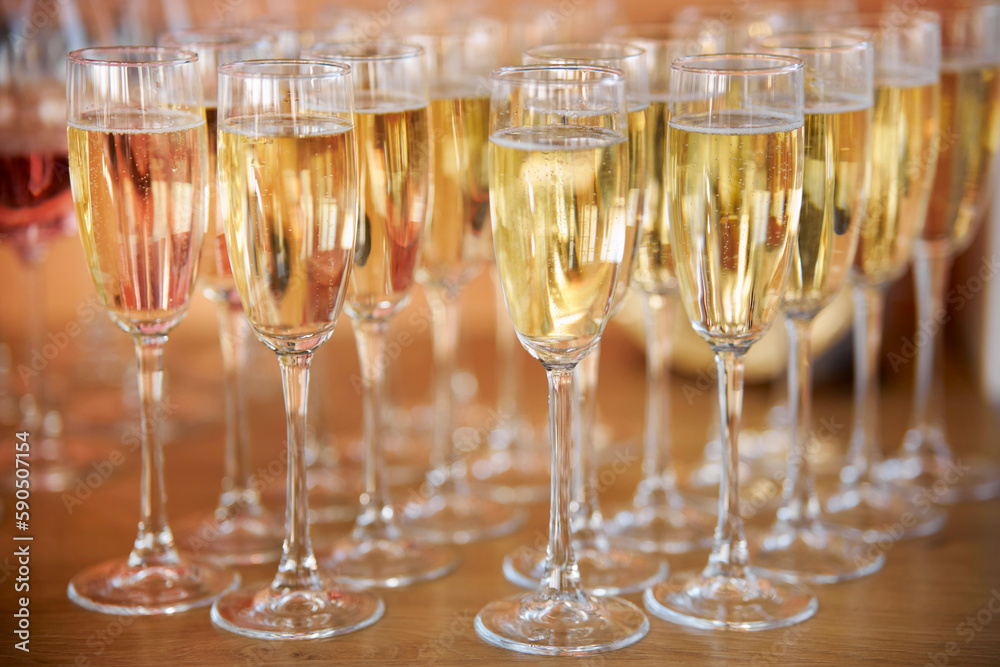 close up arranged glass on the table in abstract field in celebration time for any luxury background. many glasses of champagne, close-up, bokeh close up arranged glass on the table in abstract field in celebration time for any luxury background. many glasses of champagne, close-up, bokeh