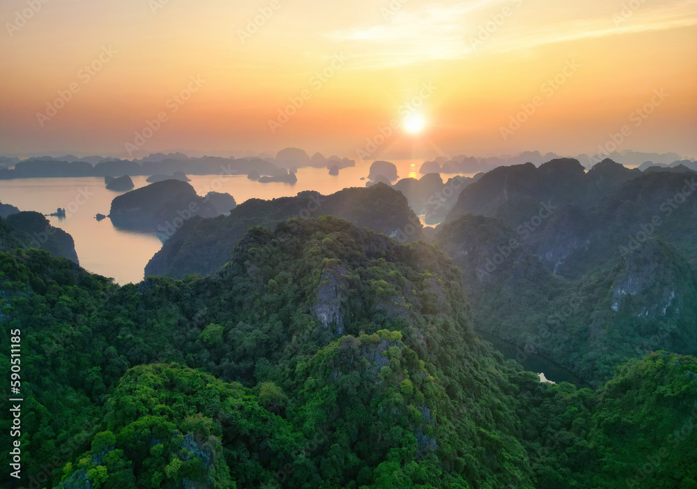 Stunning sunset of Halong Bay, Bai Tu Long Bay in Vietnam