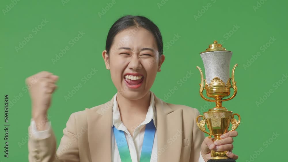 Close Up Of Asian Business Woman In A Suit With A Gold Medal And Trophy ...