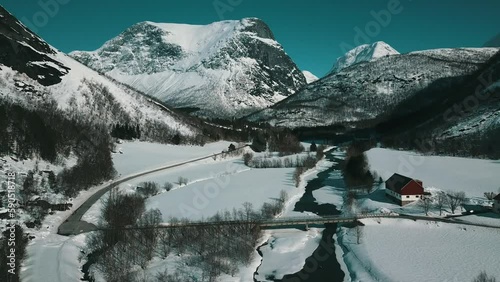 The frozen river in the mountain valley, Valldal, Gronning, More og Romsdal, Norway 2023 photo