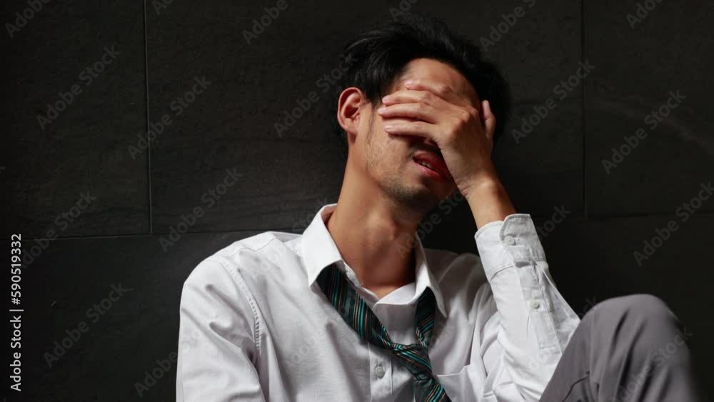 Portrait man stressed sad and tired from over working. Overworked and worried Portrait man stressed sad and tired from over working. Overworked and worried